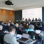 Rows of observers at desks with laptops and country name cards face a panel of eight ODIHR staff under a screen reading Limited Election Observation Mission, General Elections, USA, 5 November 2024