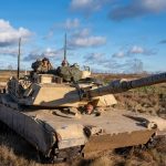 U.S. soldiers in M1A2 Abrams tanks during a NATO exercise at a training area in Poland, on the alliance's eastern flank.