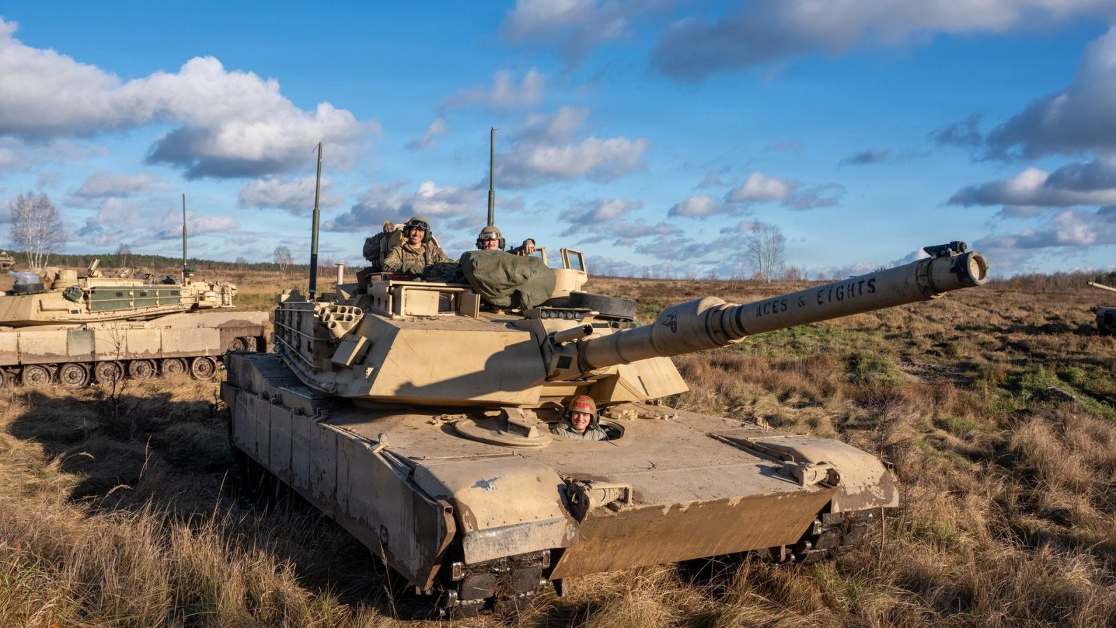 U.S. soldiers in M1A2 Abrams tanks during a NATO exercise at a training area in Poland, on the alliance's eastern flank.