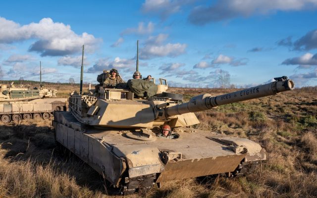U.S. soldiers in M1A2 Abrams tanks during a NATO exercise at a training area in Poland, on the alliance's eastern flank.