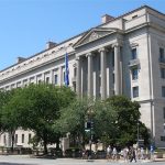 The columned limestone facade of the Robert F. Kennedy Department of Justice Building in Washington, D.C., headquarters of the U.S. Department of Justice